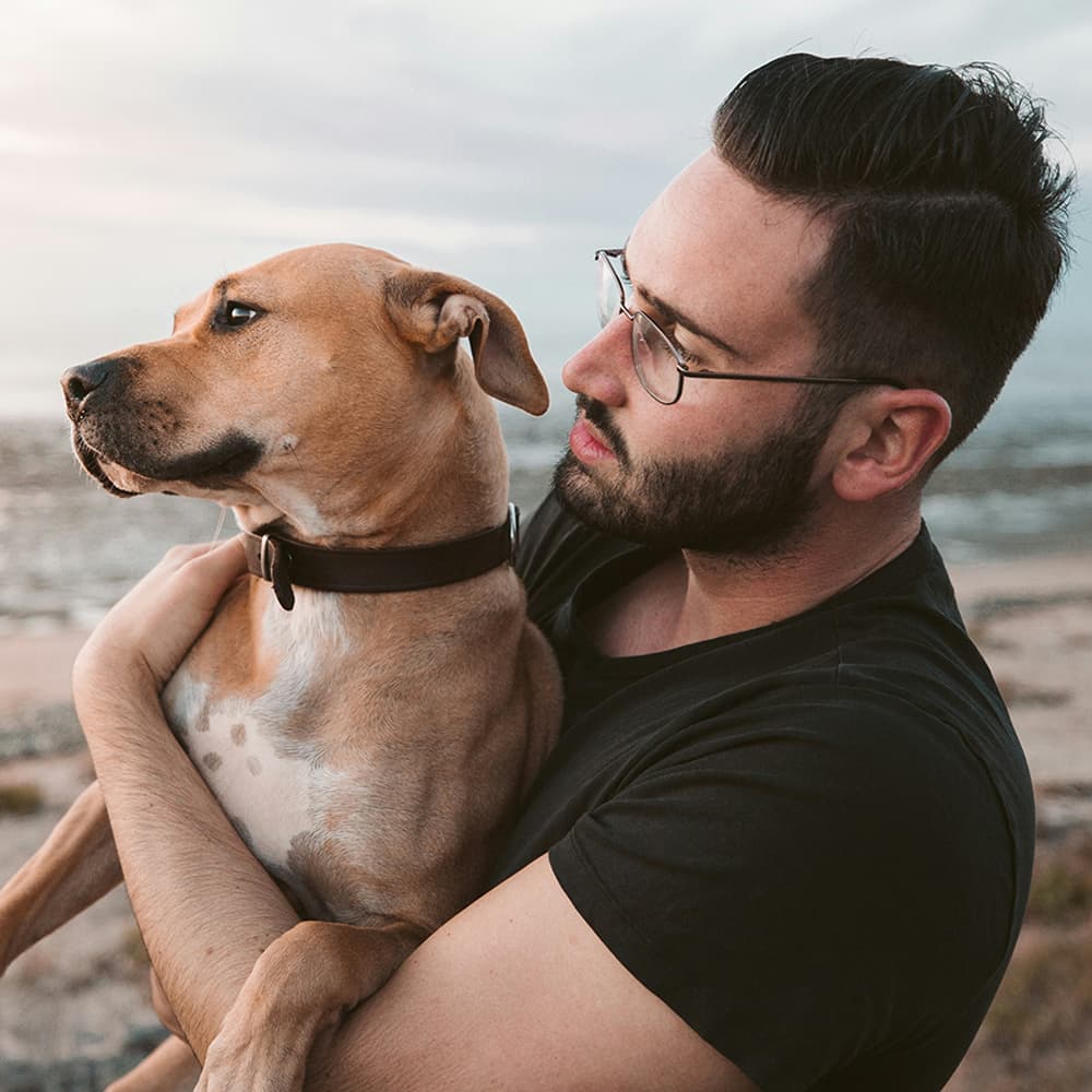 wieger-stienstra-SDWbEi94QG0-unsplash Man and dog